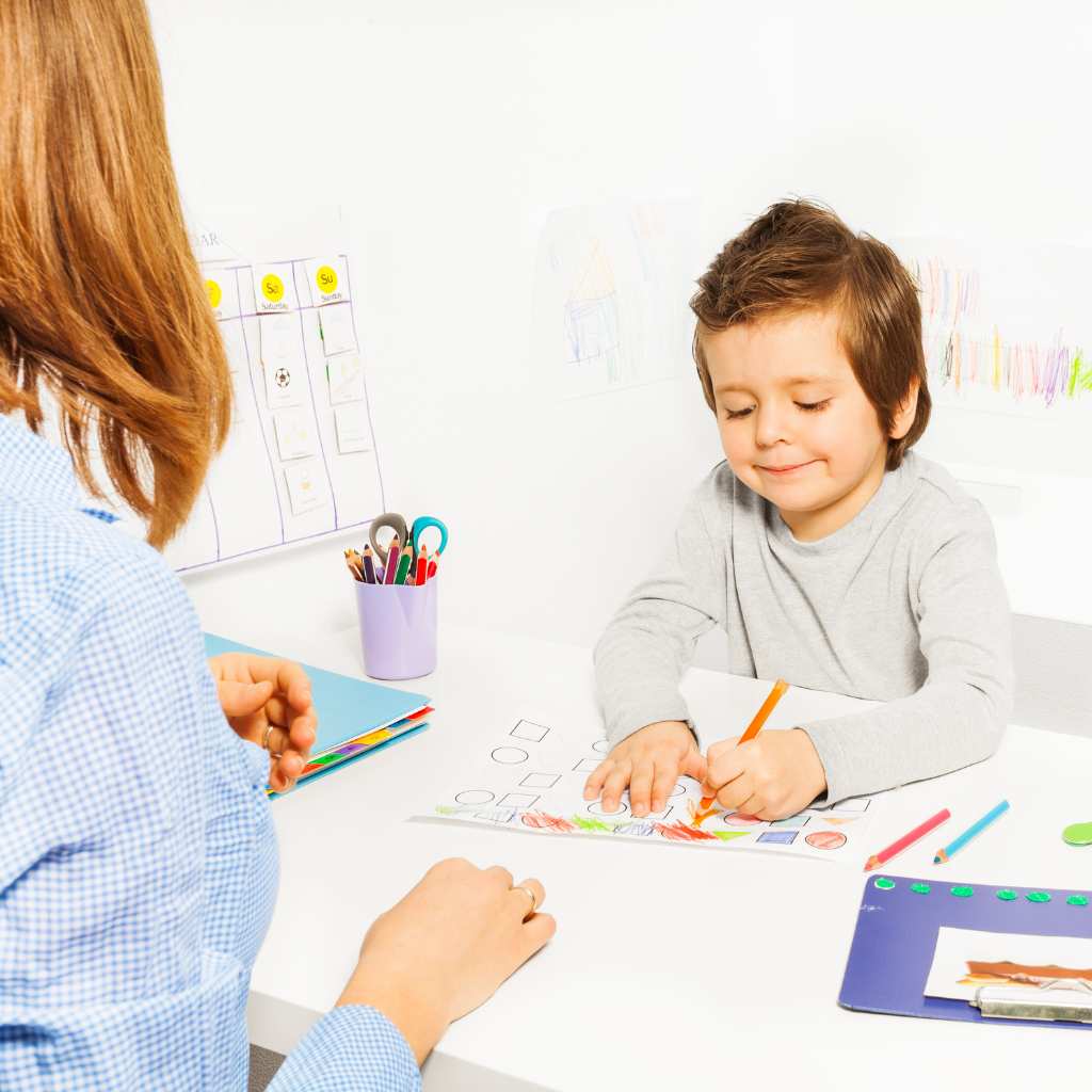 ABA therapist working with a child with autism level 1