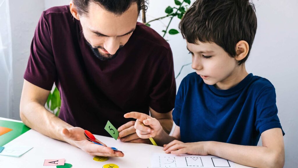Clinician explaining the difference between play therapy vs ABA therapy